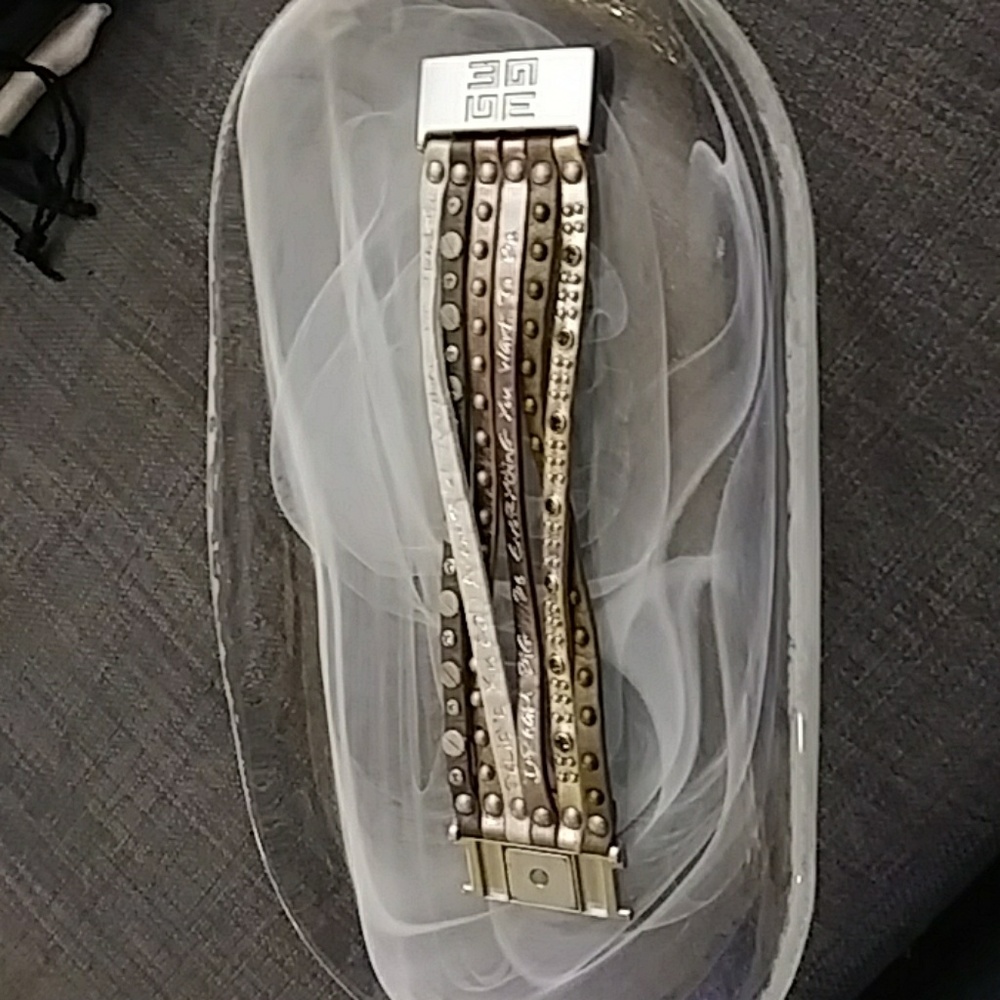 Multi strand leather metal and rhinestone bracelet
